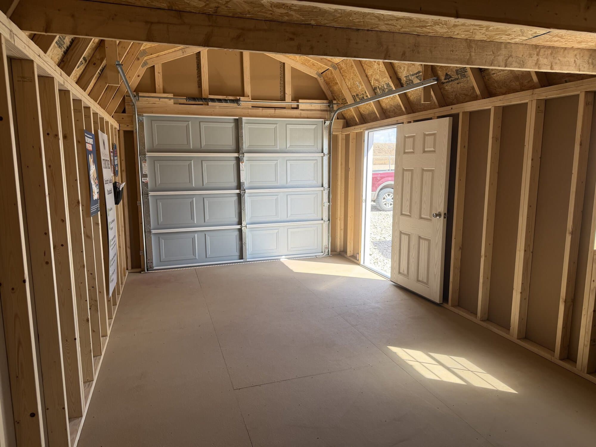 Inside red lofted garage